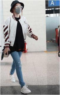 张靓颖机场吃瓜,网友热议幕后故事